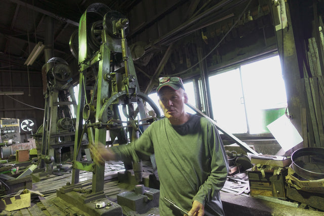Takeshi Saji at the power hammers in his Echizen workshop, 2019