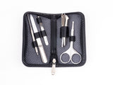 A travel grooming set by GreenBell Takumi No Waza, consisting of tweezers, nail clippers, nail files, scissors, and earpicks, displayed in an open black case with a striped pattern.